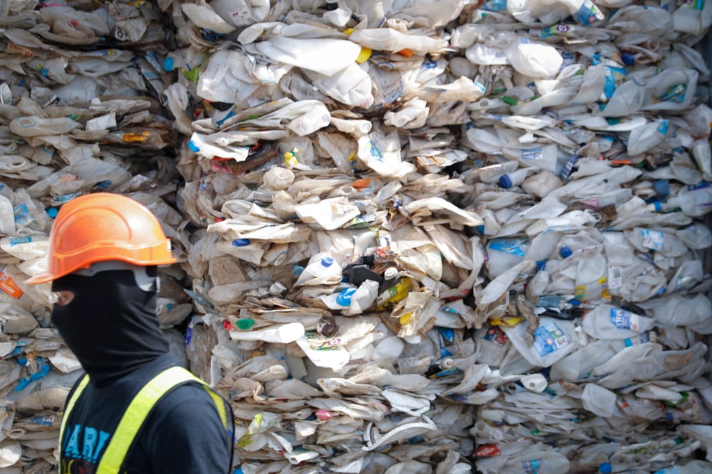 A container filled with plastic waste from Australia in Port Klang, Malaysia, in 2019. Photo: AP A container filled with plastic waste from Australia in Port Klang, Malaysia, in 2019. Photo: AP